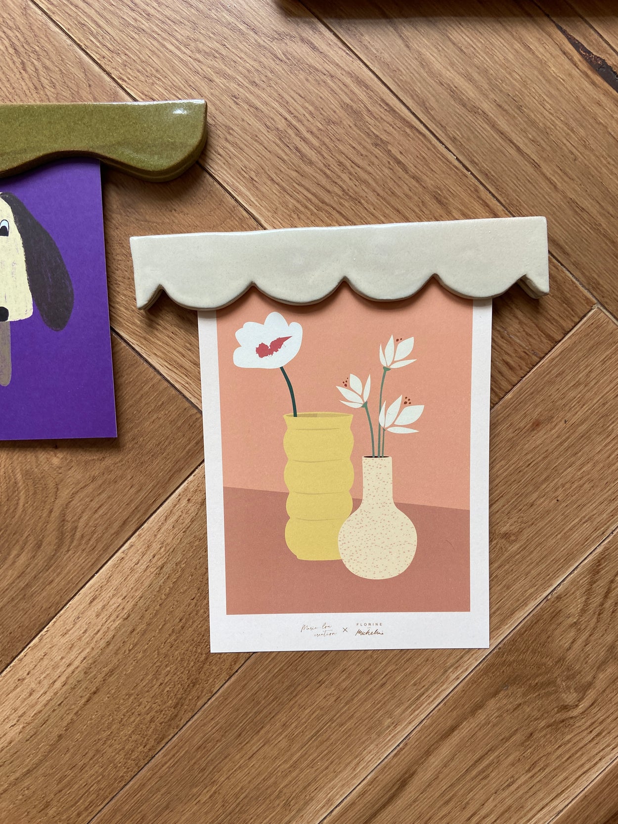 porte affiche blanc créé par FLorine est Micheline