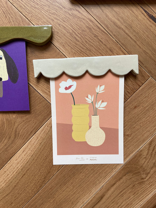 porte affiche blanc créé par FLorine est Micheline