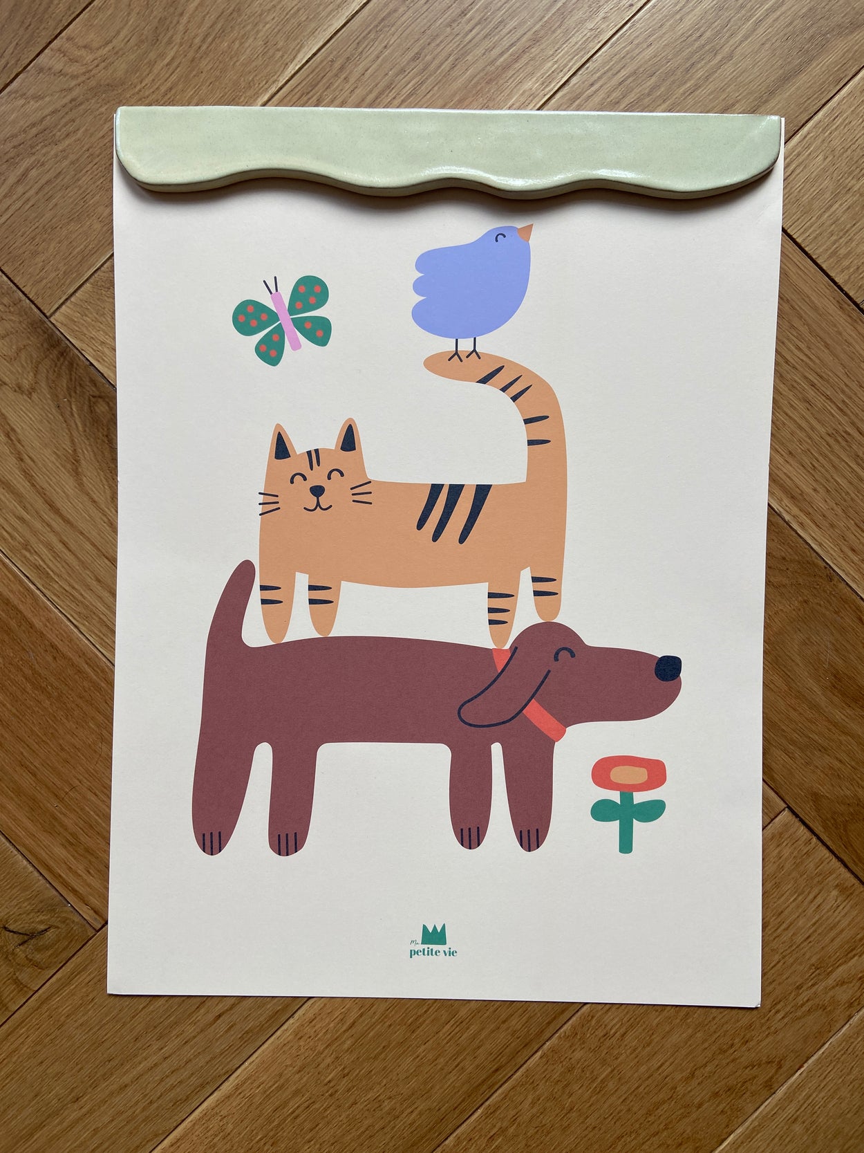 porte affiche blanc nacrée créé par Florine est Micheline dans son atelier de Lille